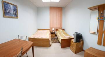 Фото номера Семейный номер с общей ванной комнатой Гостевой дом «Вояж» г. Великий Новгород 3