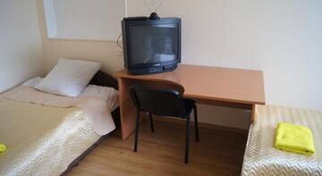 Фото номера Трехместный номер эконом-класса Гостиница Alyans Guest House г. Великий Новгород 6